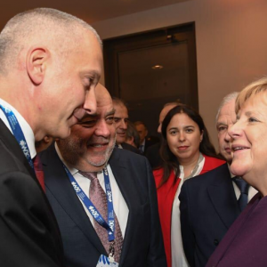 Boris Lozhkin with Angela Merkel